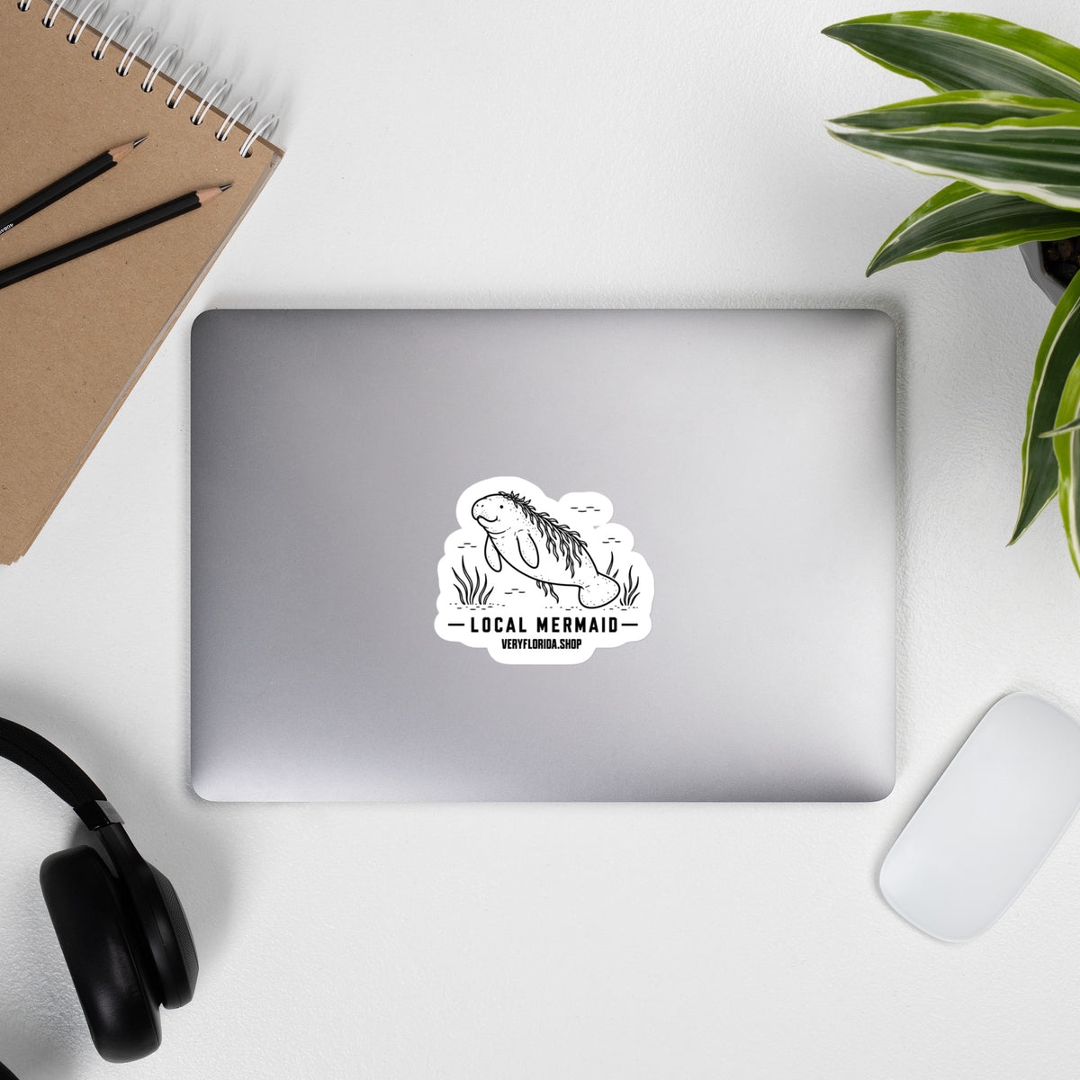 Local Mermaid Florida manatee sticker on laptop